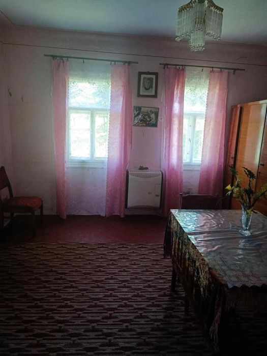 Продам дерев'яний будинок у с. Попелі.