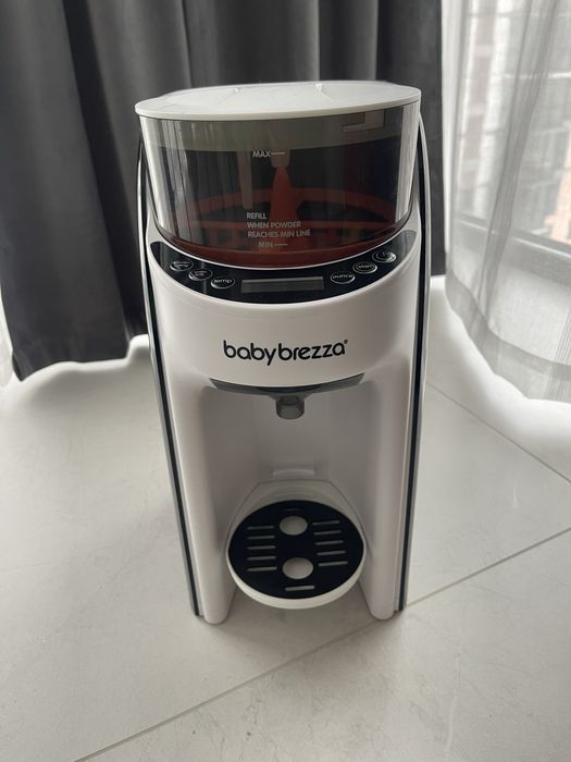 Пристрій для приготування дитячоі суміши Baby Brezza