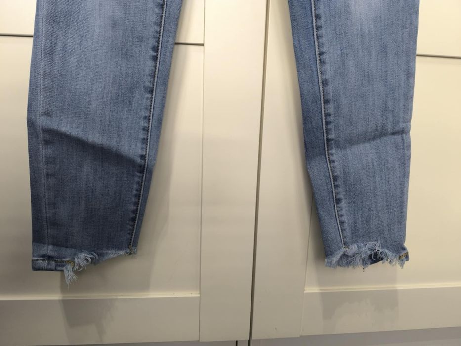 Spodnie jeansy wysoki stan skinny rurki dżinsy 10 M 38 szarpane nogawk