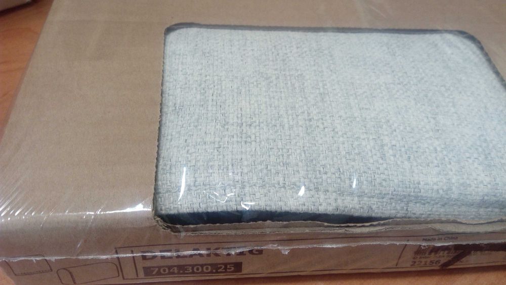 DELAKTIG pokrycie oparcia / podłokietnika 704.300.25 jasny