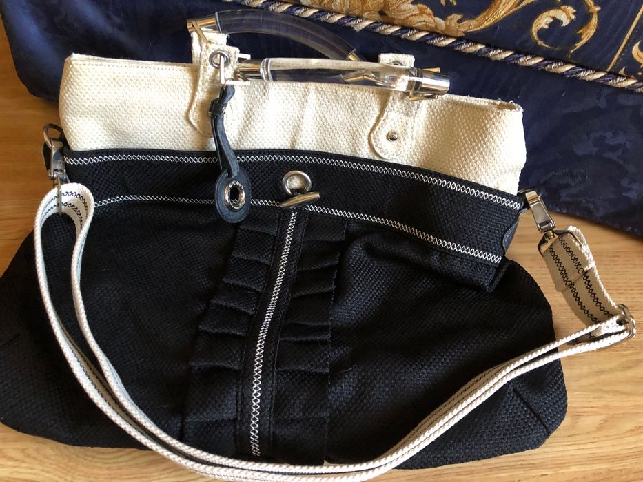 Mala preta e pérola