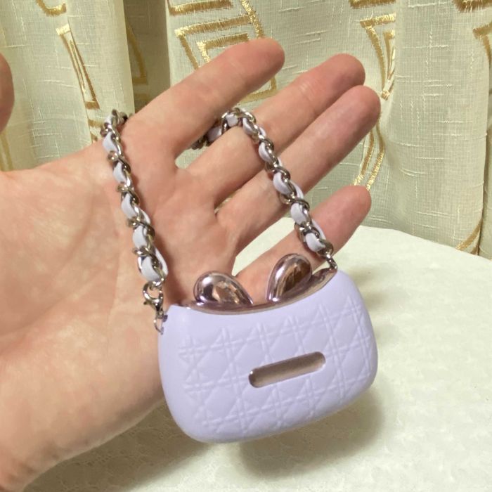 Жіночі бездротові Bluetooth навушники у футлярі-сумочці з павербанком