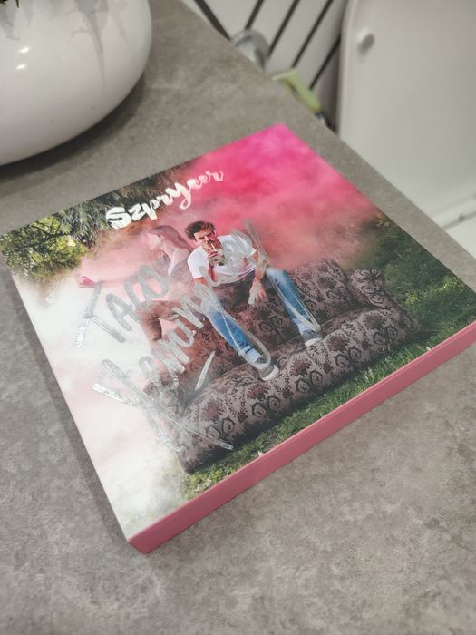 Płyta z oryginalnym podpisem i plakatem