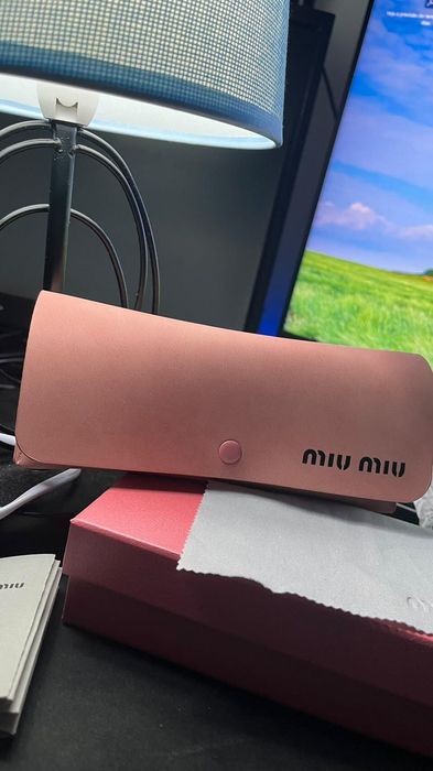Óculos de sol miumiu