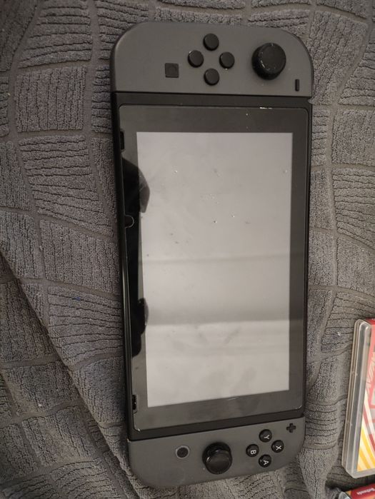 Nintendo switch usada com jogos