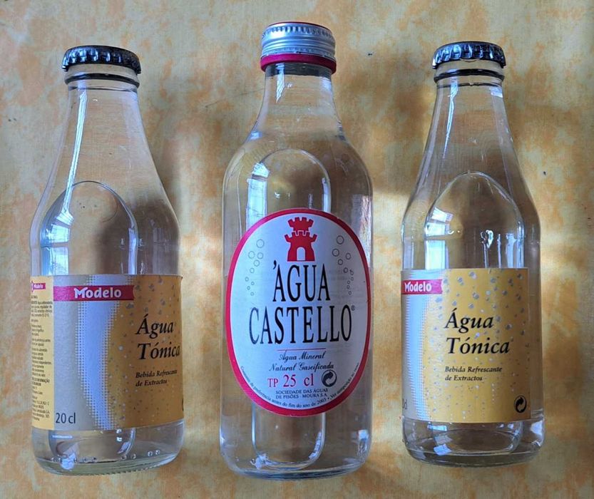 Grade Trinaranjus, garrafas de vidro Frisumo, Castello, Coke anos 90