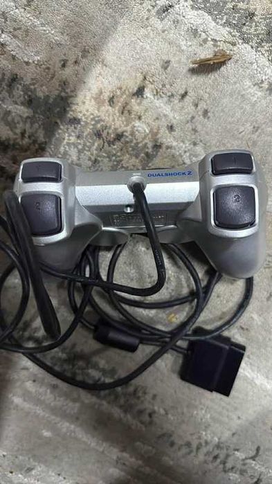 PlayStation 2  srebrny  dualshock 2 pad w stanie  idealnym bez wad ps2