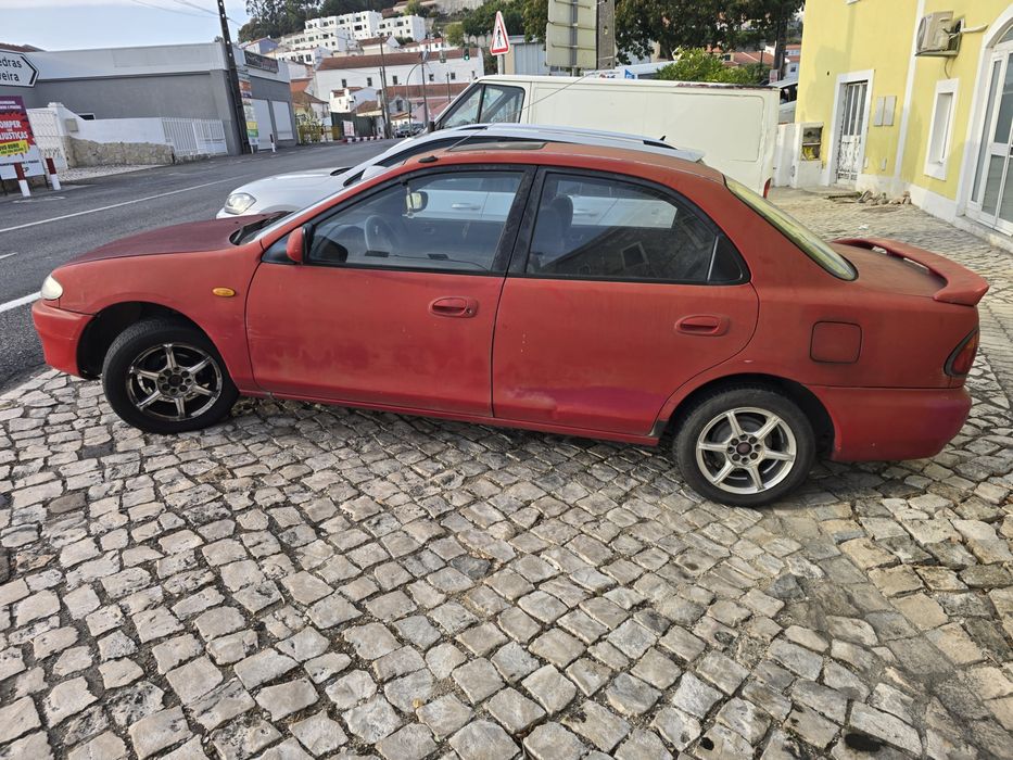 Mazda 323 s 1.5 gasolina — photo 2