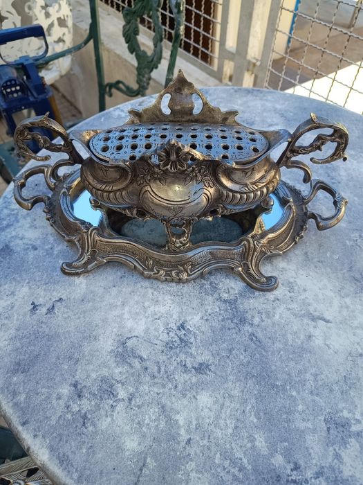 Par de pavões em bronze