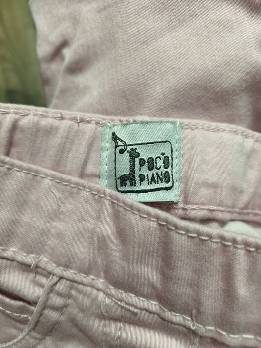 Nowe jeansy dziewczęce z kwiatuszkiem PocoPiano 110