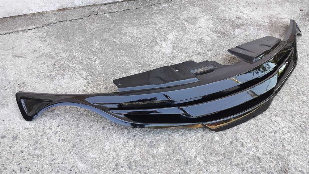 Тюнінг Nissan Juke - накладки бамперів, спойлери, решітка, пороги