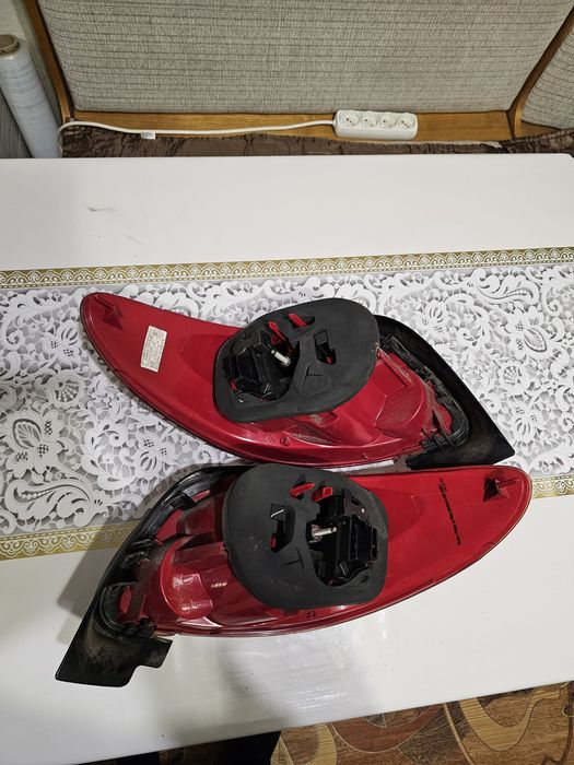 Задні фари Peugeot 206 дорестайлінг та рестайлінг