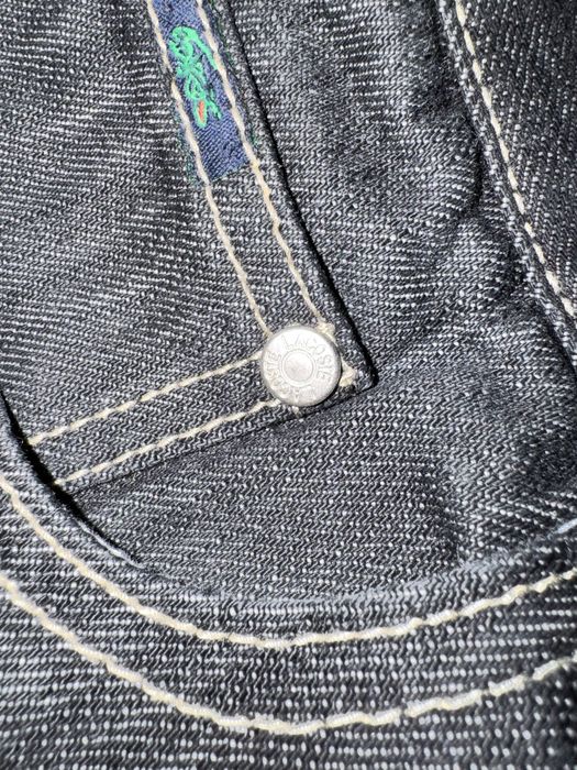 Джинси Lacoste