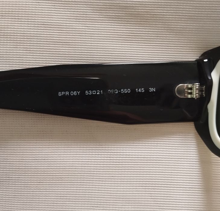 Óculos de sol Prada como novos