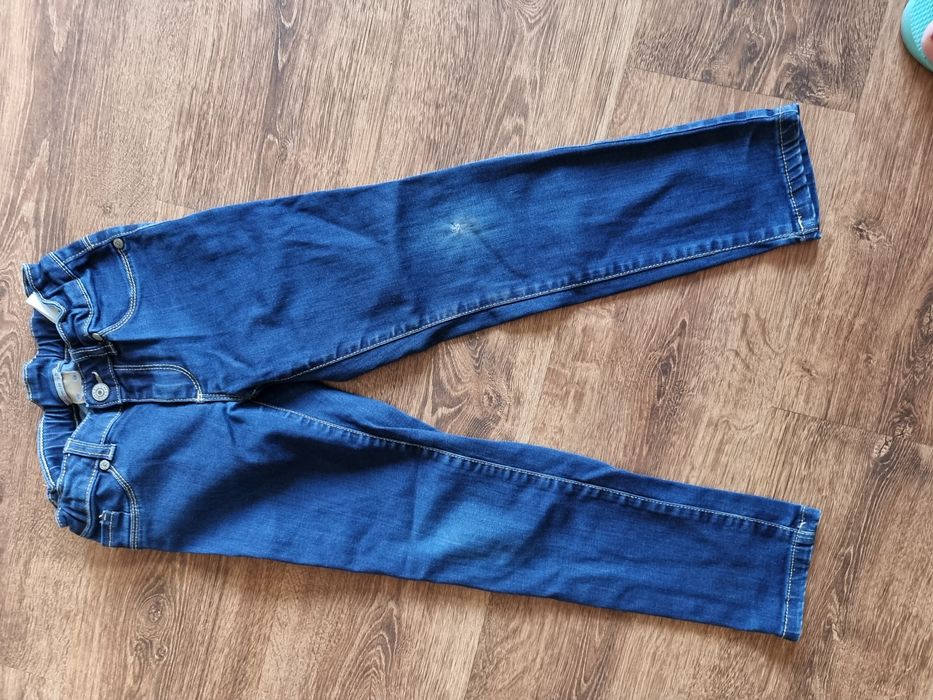 Spodnie jeans 128