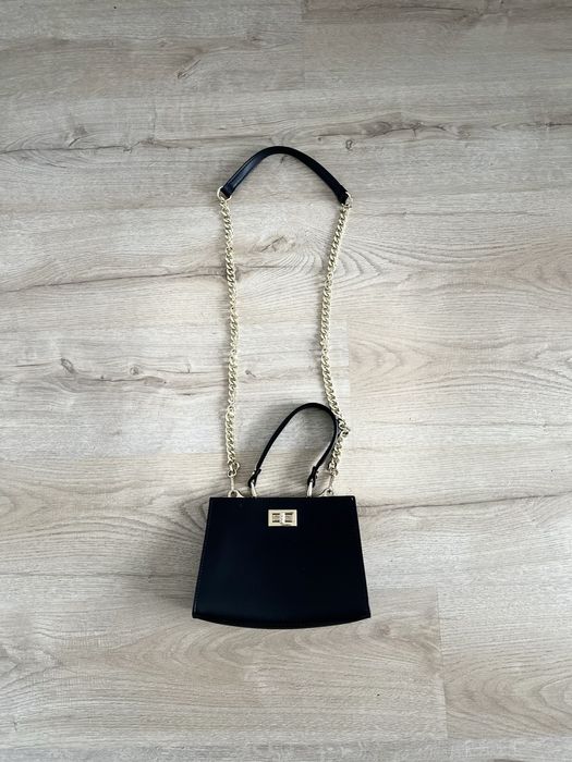 Skórzana mini torebka z rączką Ryłko