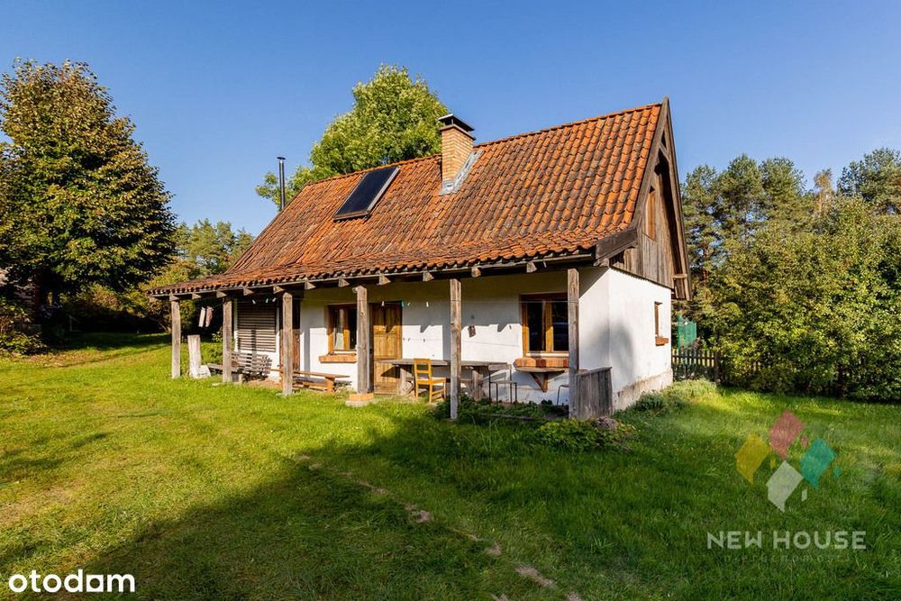 Dom wolnostojący w stylu warmińskim, las, jezioro