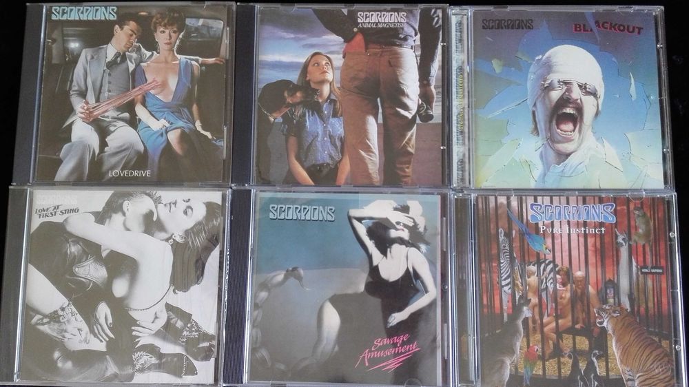 CDs Scorpions, AC/DC, ZZ Top, Bon Jovi, Status Quo e outros
