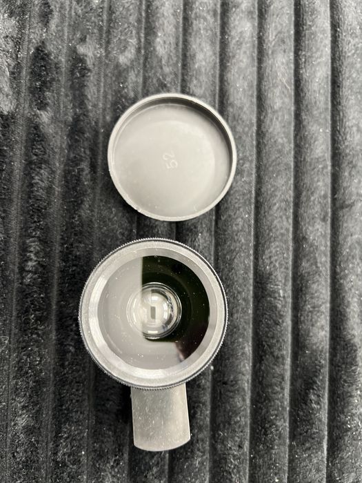 Увеличительное стекло на телефон.