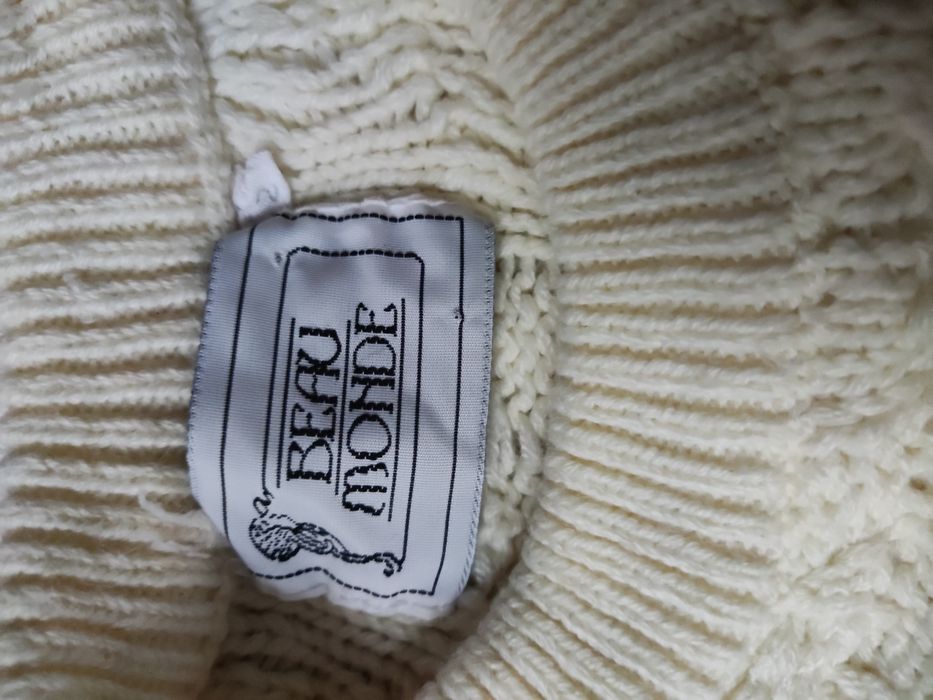 Sweter z grubym wzorem warkocz