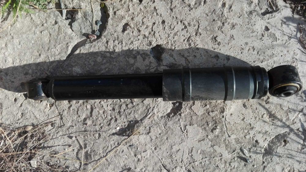 Амортизатор задній Опель