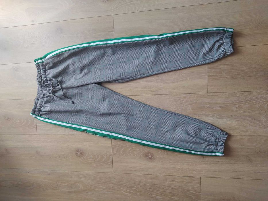 Damskie spodnie w kratkę rozm 38