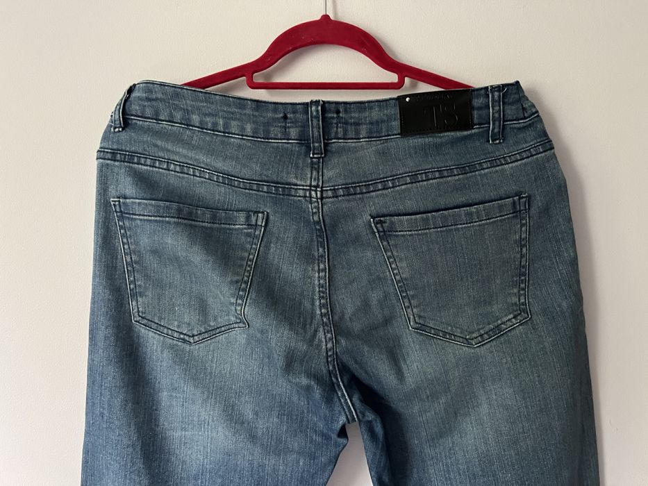 Jeansowe spodnie z postrzępieniami slim fit Top Secret roz. 42 / XL