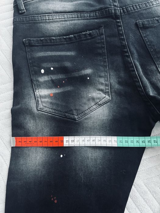 Spodnie meskie Dsquared2 czarne nakrapiane dziury