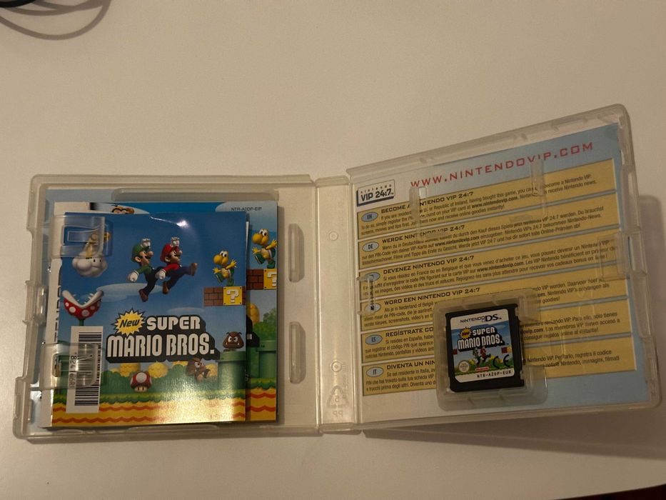 Nintendo DS (classica/Phat) azul e jogos (Mario bros, Nintendogs, etc)