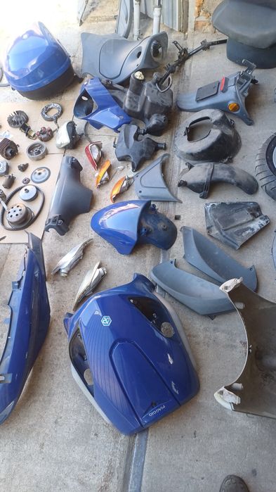 Piaggio FLY 50 części kufer,wydech,lampa,pokrywa,stelaż,wał,błotnik,
