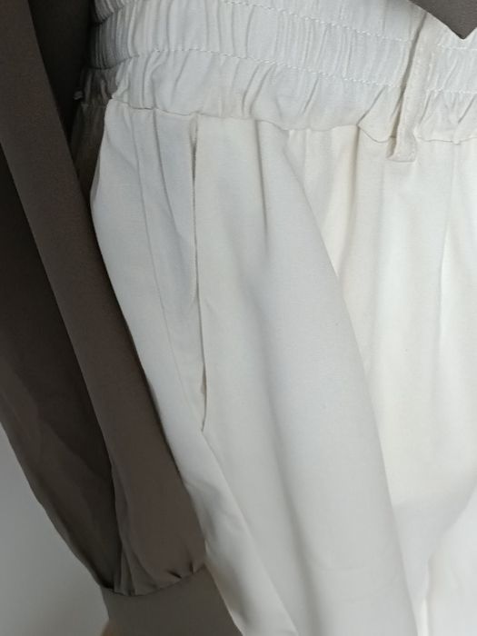 Nowe kremowe spodnie eleganckie wysoki stan wiskoza L XL