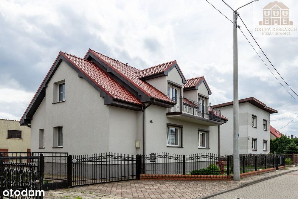 Dom z dwoma mieszkaniami i dużą działką