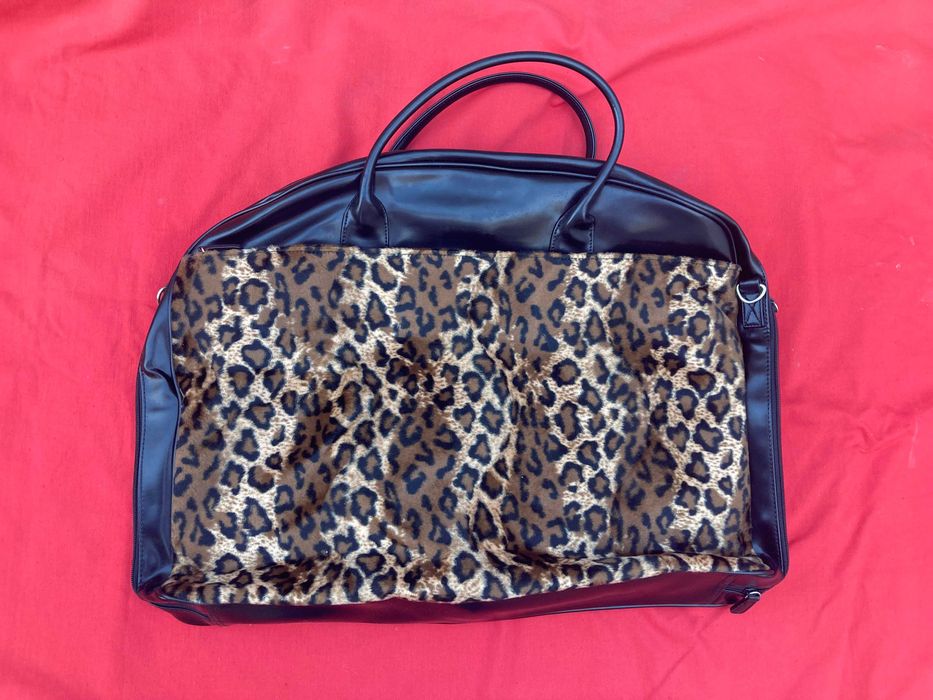 Saco de Viagem Porta fatos com cabide padrão tigre da marca Avon