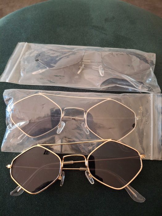 3 pares de óculos de sol