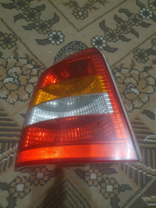 Задній ліхтар стоп Opel Astra G хетчбек (90521542