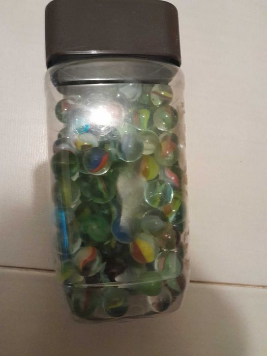 Frasco com berlindes