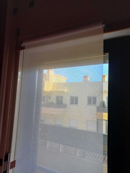 Estore de enrolar para porta