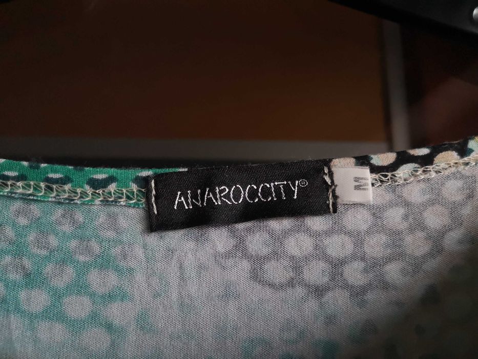 Macacão em tons azuis esverdeados, M