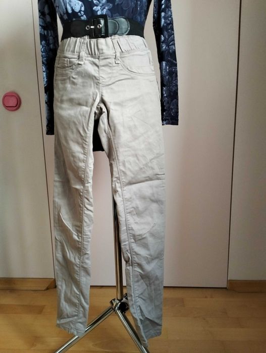 Damskie spodnie typu jeaginsy firmy Tally Weill rozmiar 32.