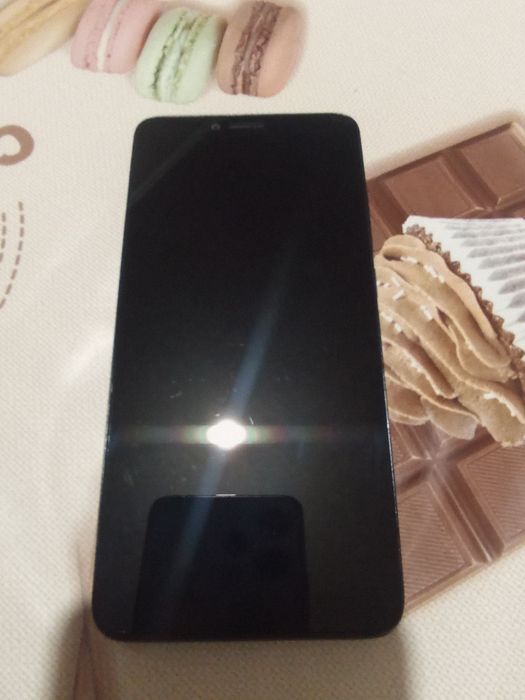 Телефон TCL T607