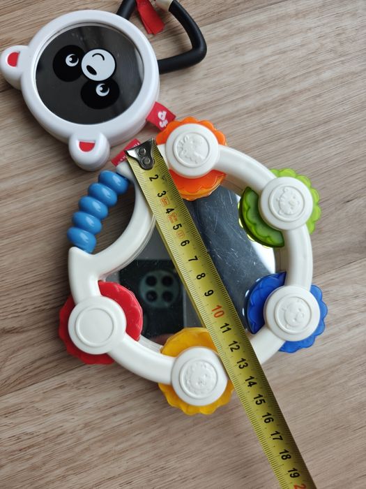 Dwie zabawki grzechotki Fischer Price