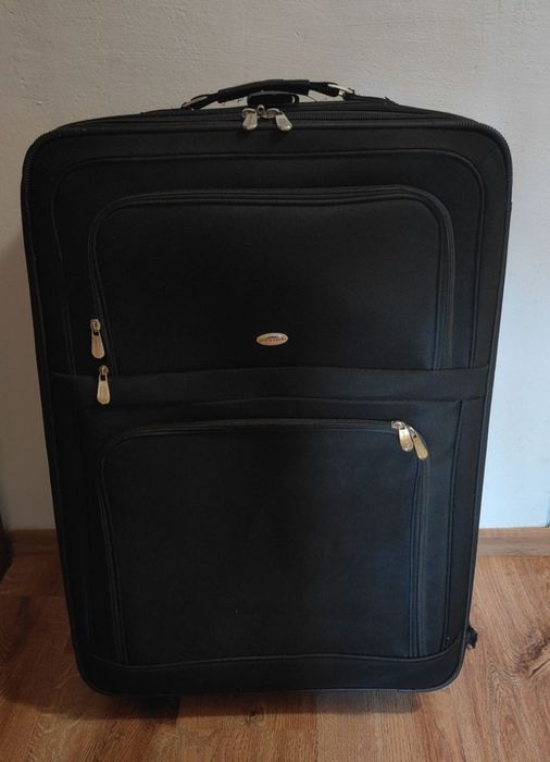 Walizka duża podróżna na kółkach obrotowych miękka , solidna bagaż.