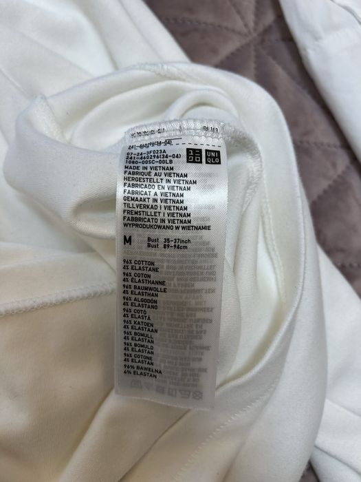 Білий гольф з коміром Uniqlo
