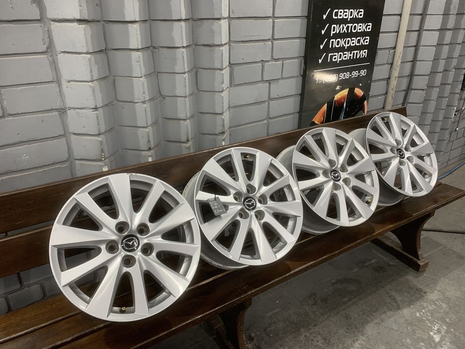 99 Оригинальные литые диски Mazda 5/114.3 R17 et50