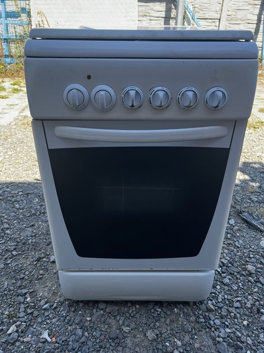 Kuchenka gazowa z piakarnikirm elektrycznym