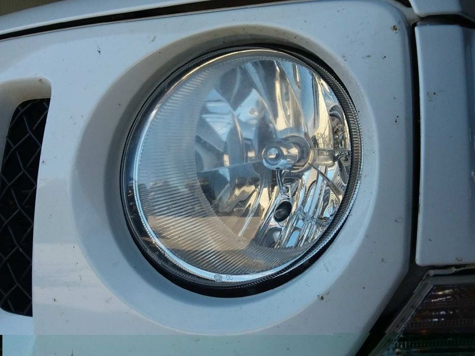 FAROL ESQUERDO JEEP PATRIOT LIMITED