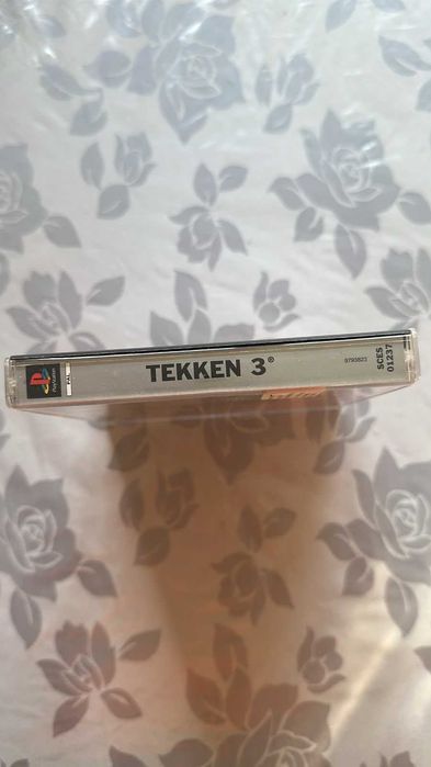 Tekken 3 PS1 PAL Platinum – Completo com Manual (SCES-01237)