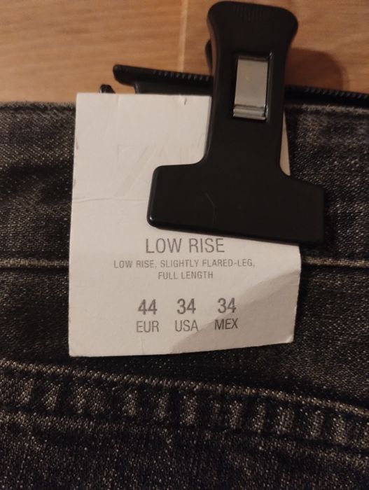 Męskie czarne spodnie jeansowe flare Zara r.44
