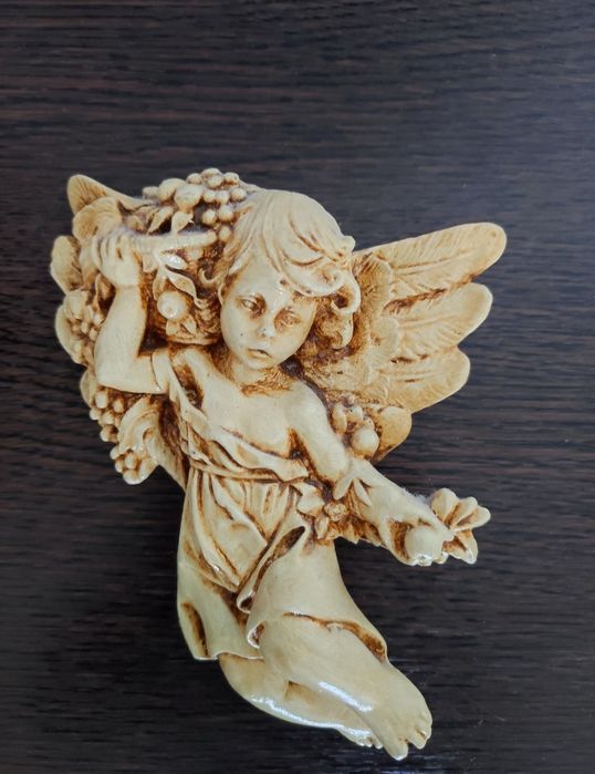 Conjunto de anjos em marfinite