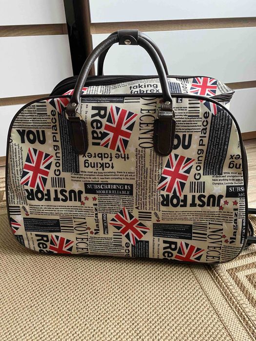 Дорожня сумка на колісах